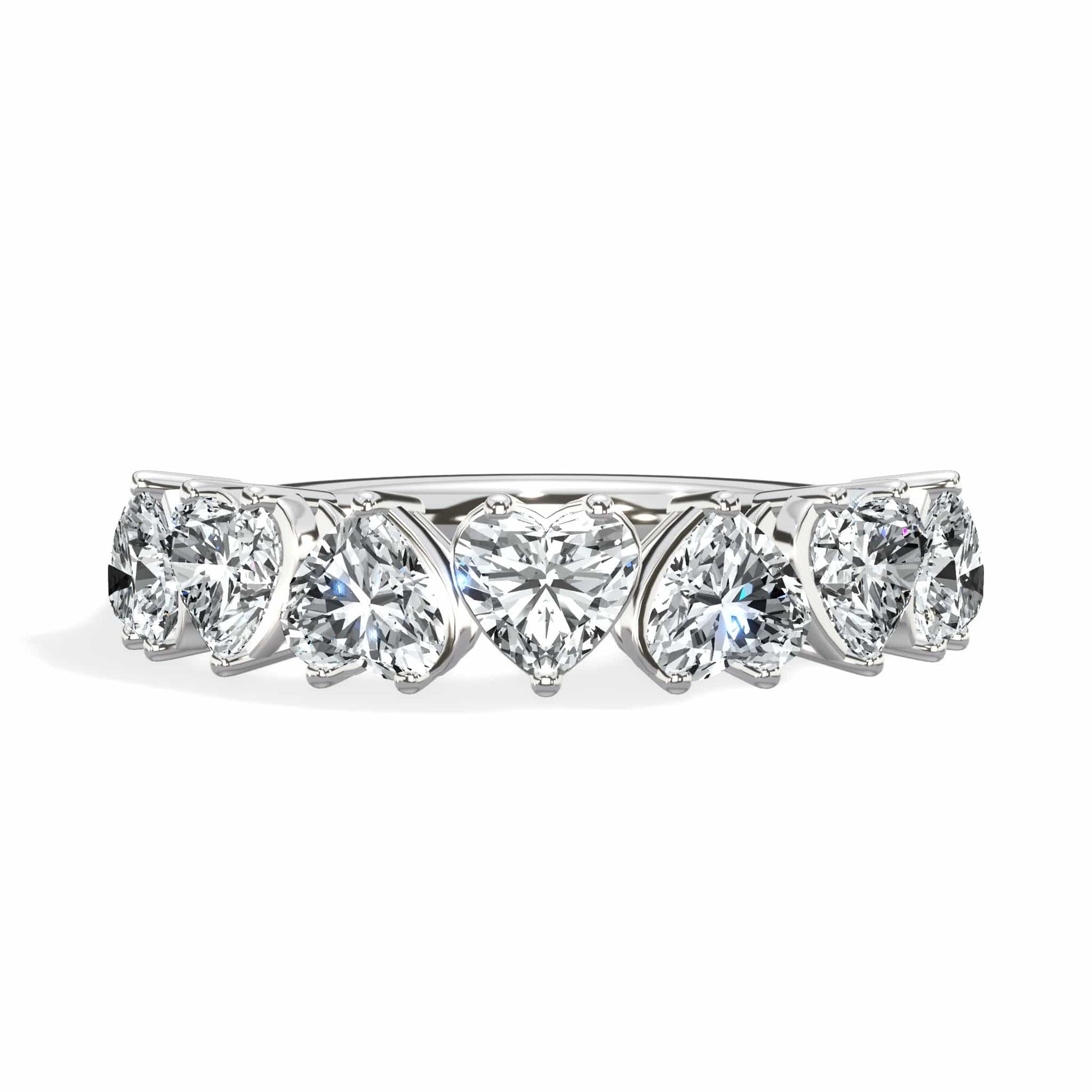 Diamond band ring with heart and round stones.