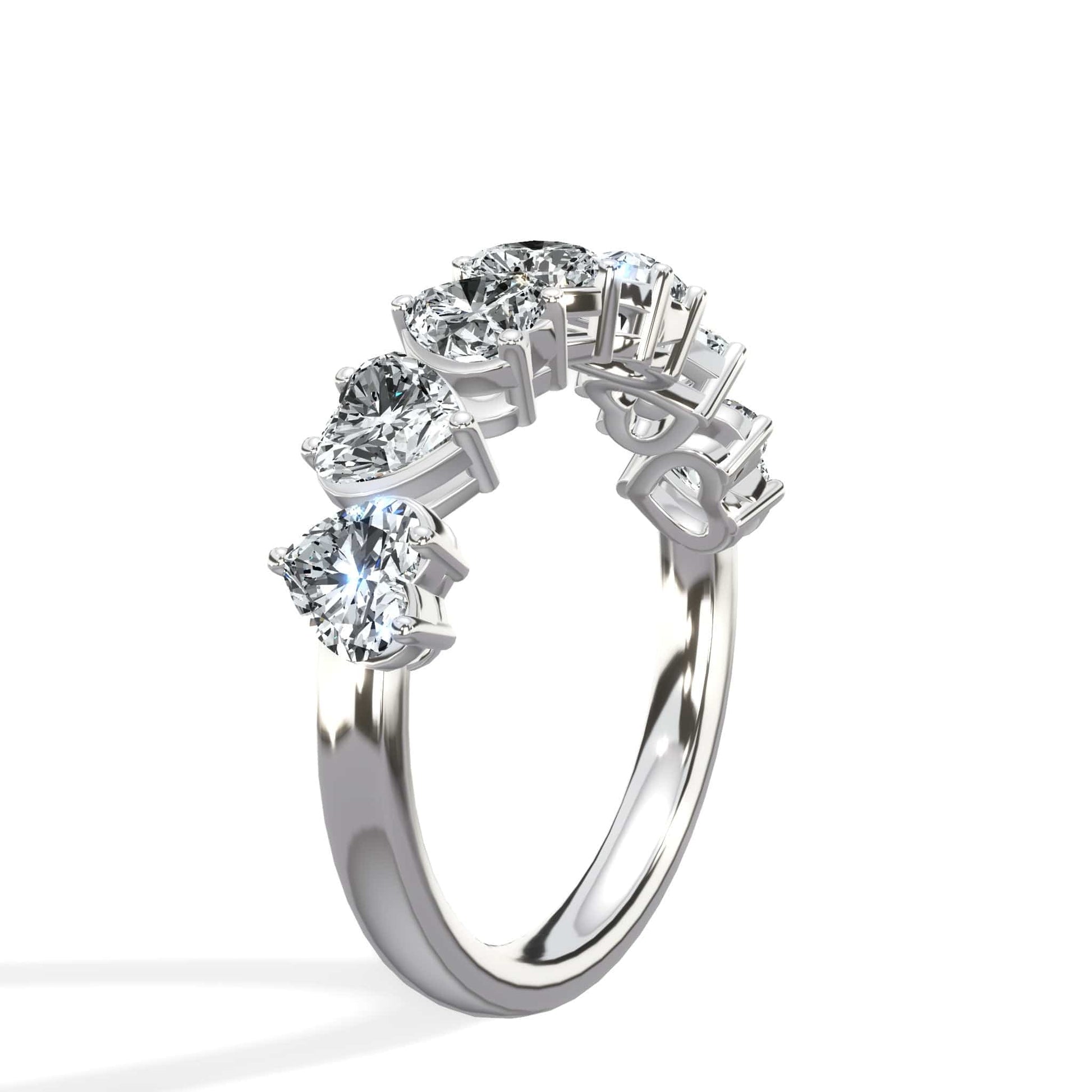 Diamond ring with heart-shaped stones.