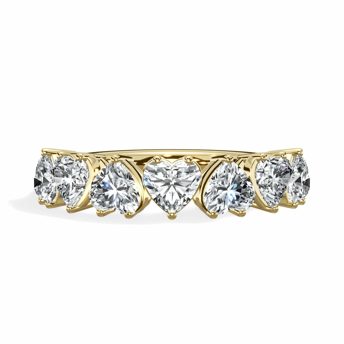 Gold ring with heart-shaped diamonds.
