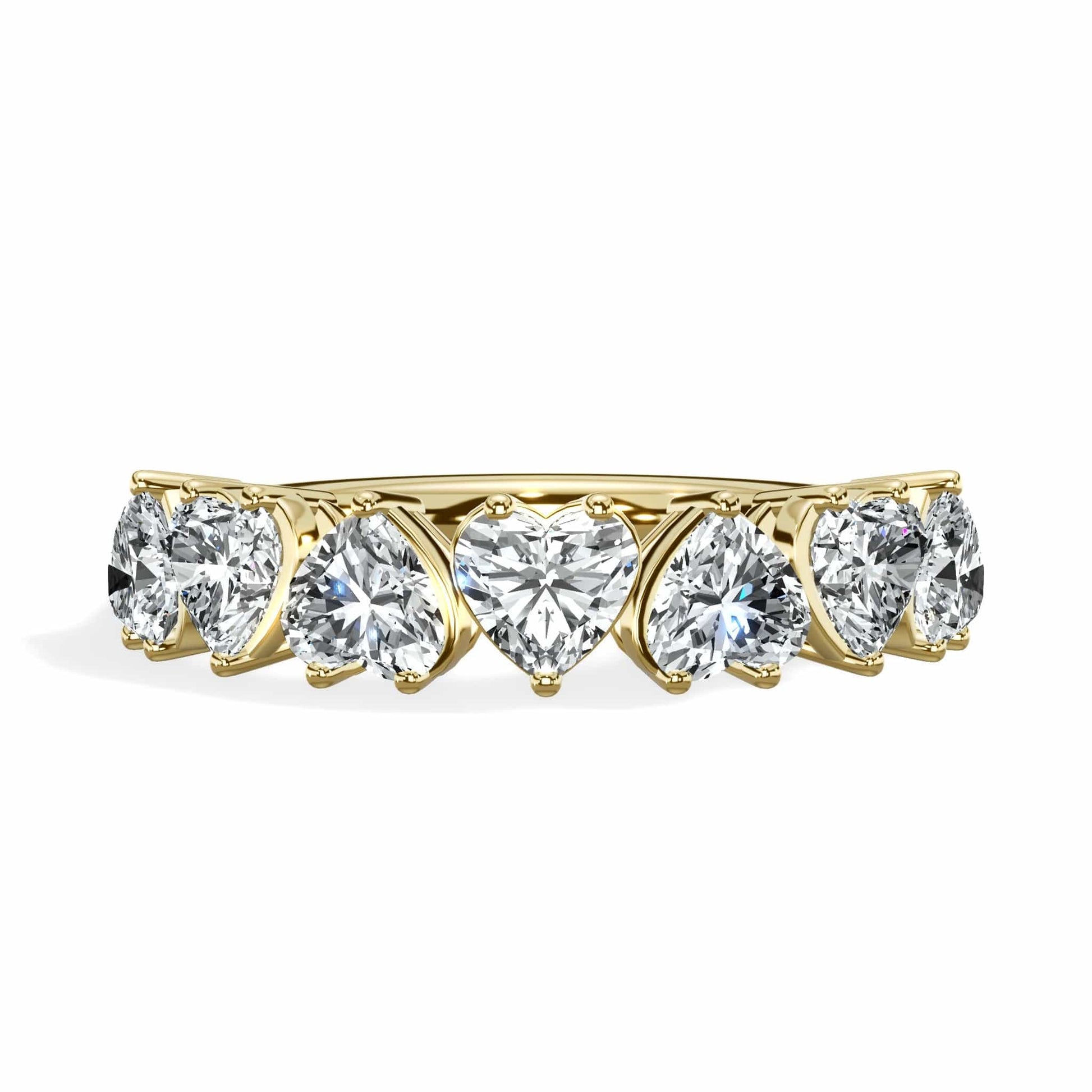 Gold ring with heart-shaped diamonds.