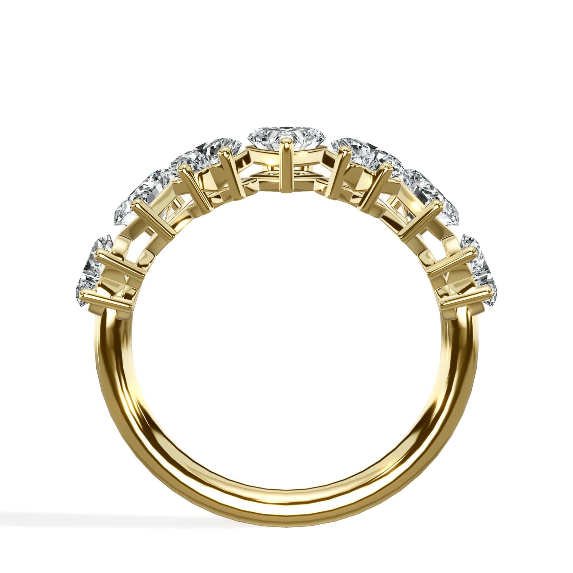 Gold ring with seven diamonds.