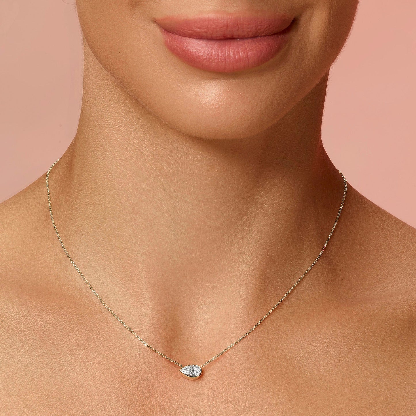 1 Carat Lab Grown Pear Shaped Bezel Set East-West Diamond Solitaire Pendant Necklace