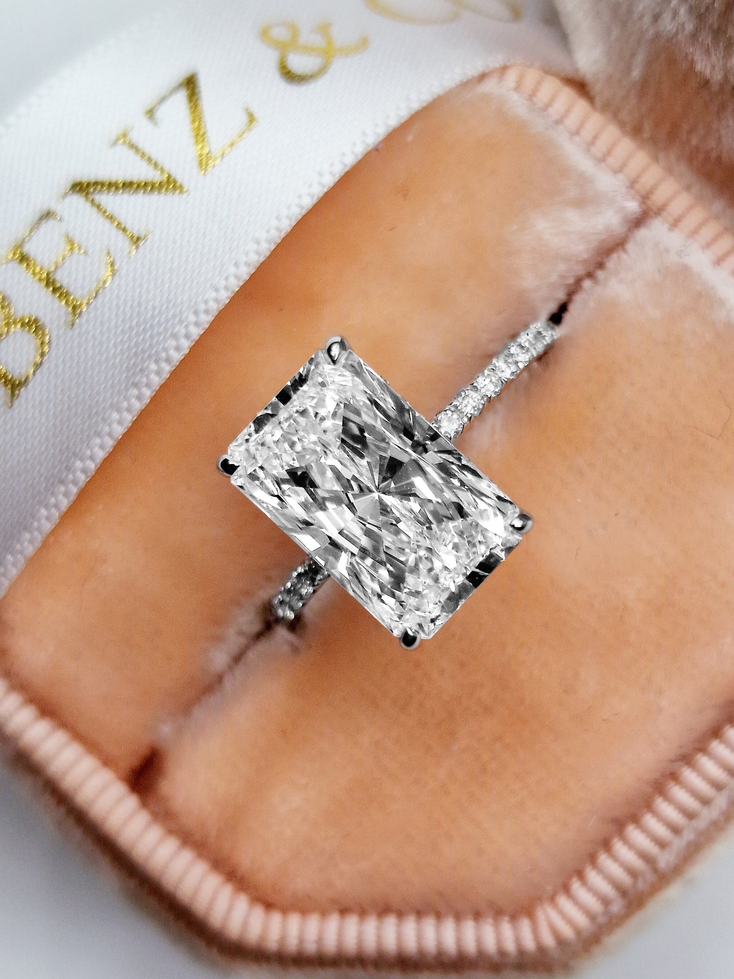 Diamond ring in a velvet ring box.