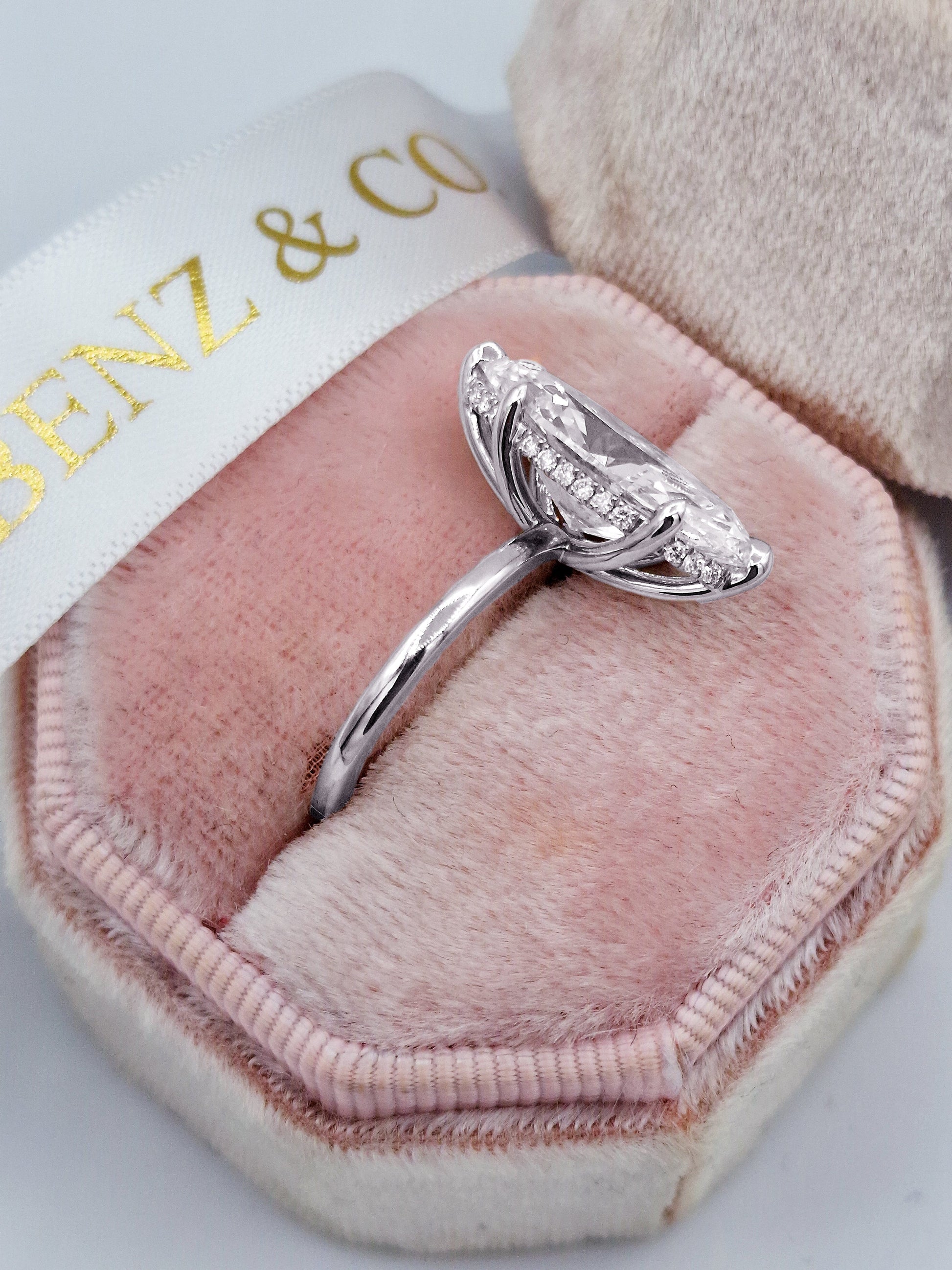 Marquise hidden halo diamond solitaire engagement ring