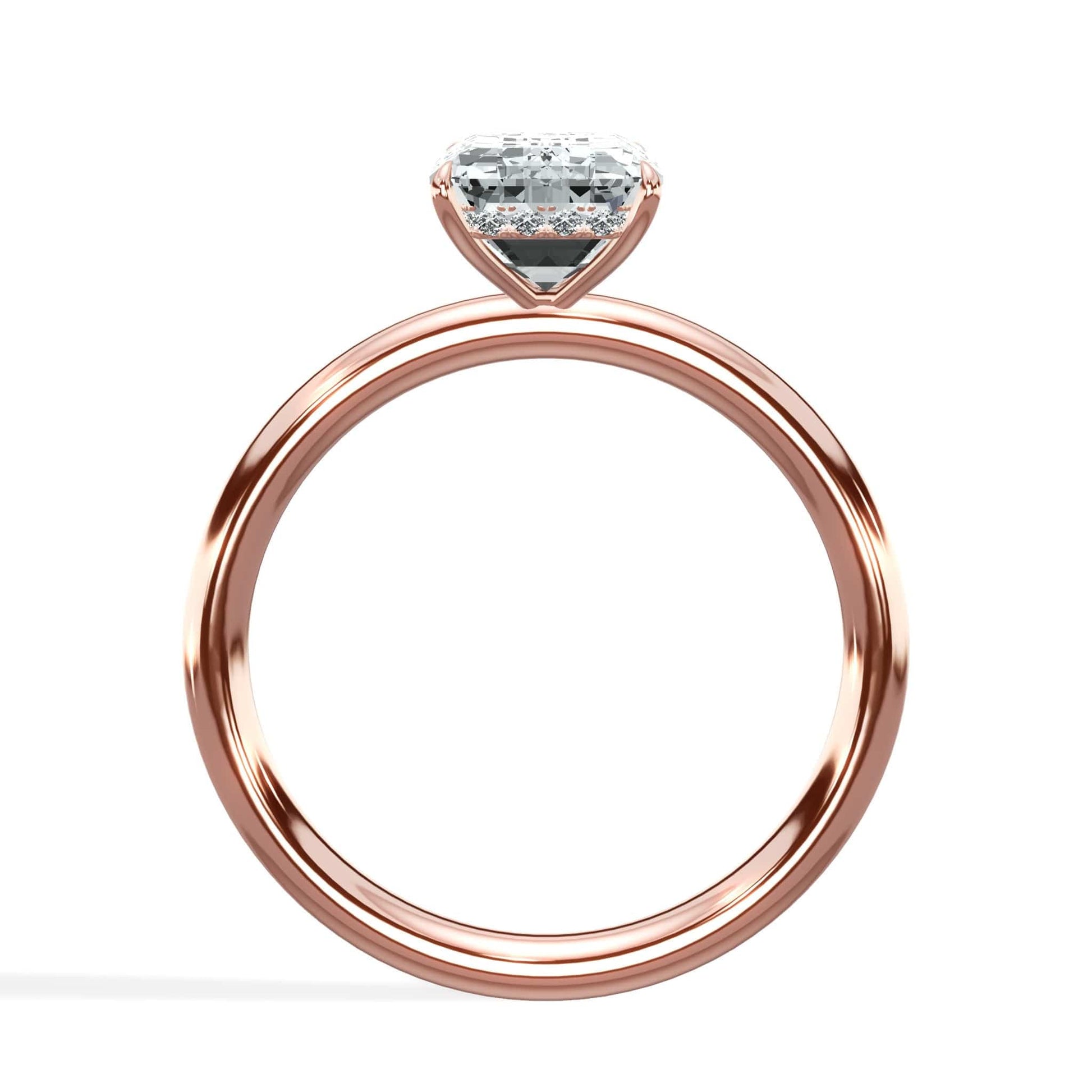 Rose gold emerald and diamond ring