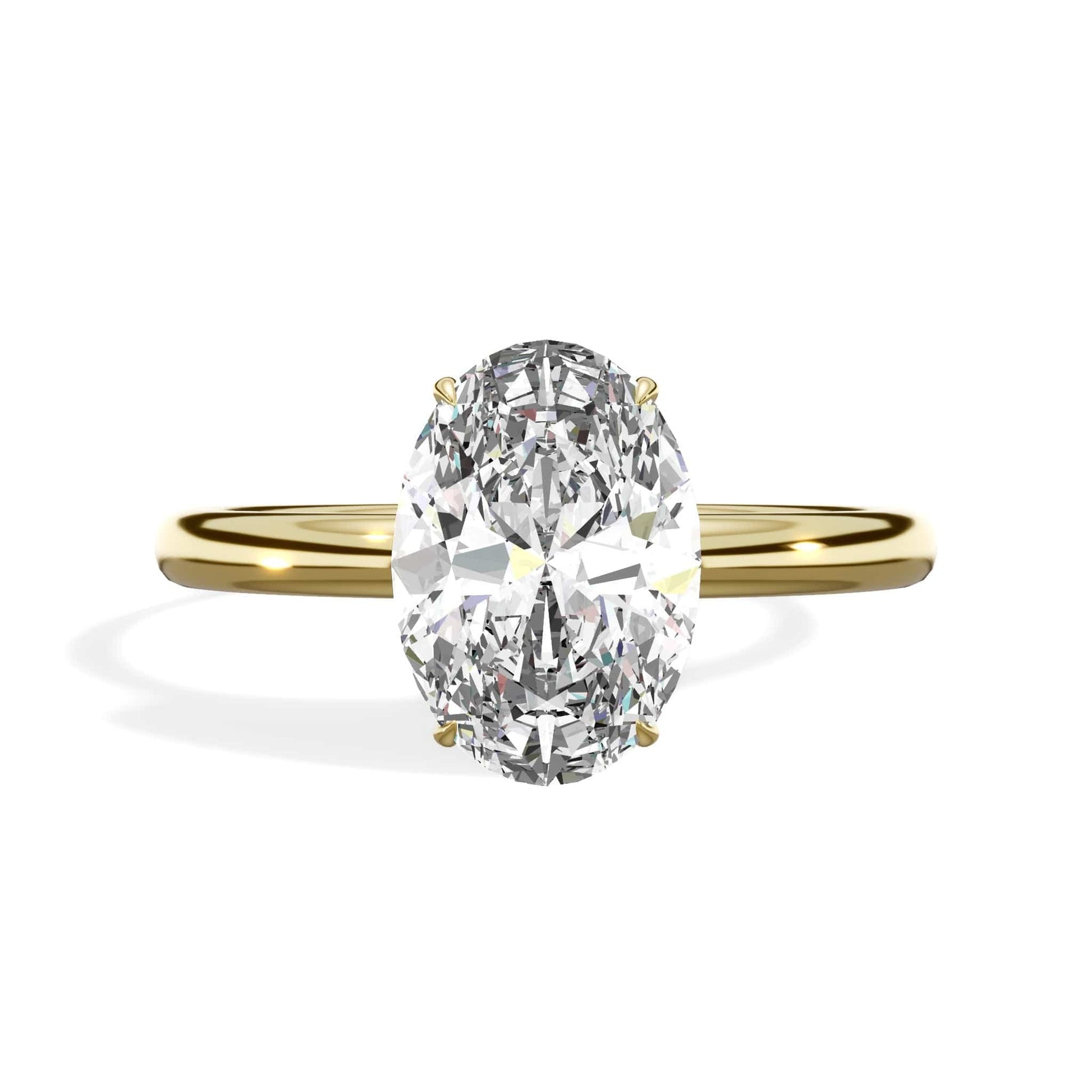 Oval diamond ring in yellow gold
