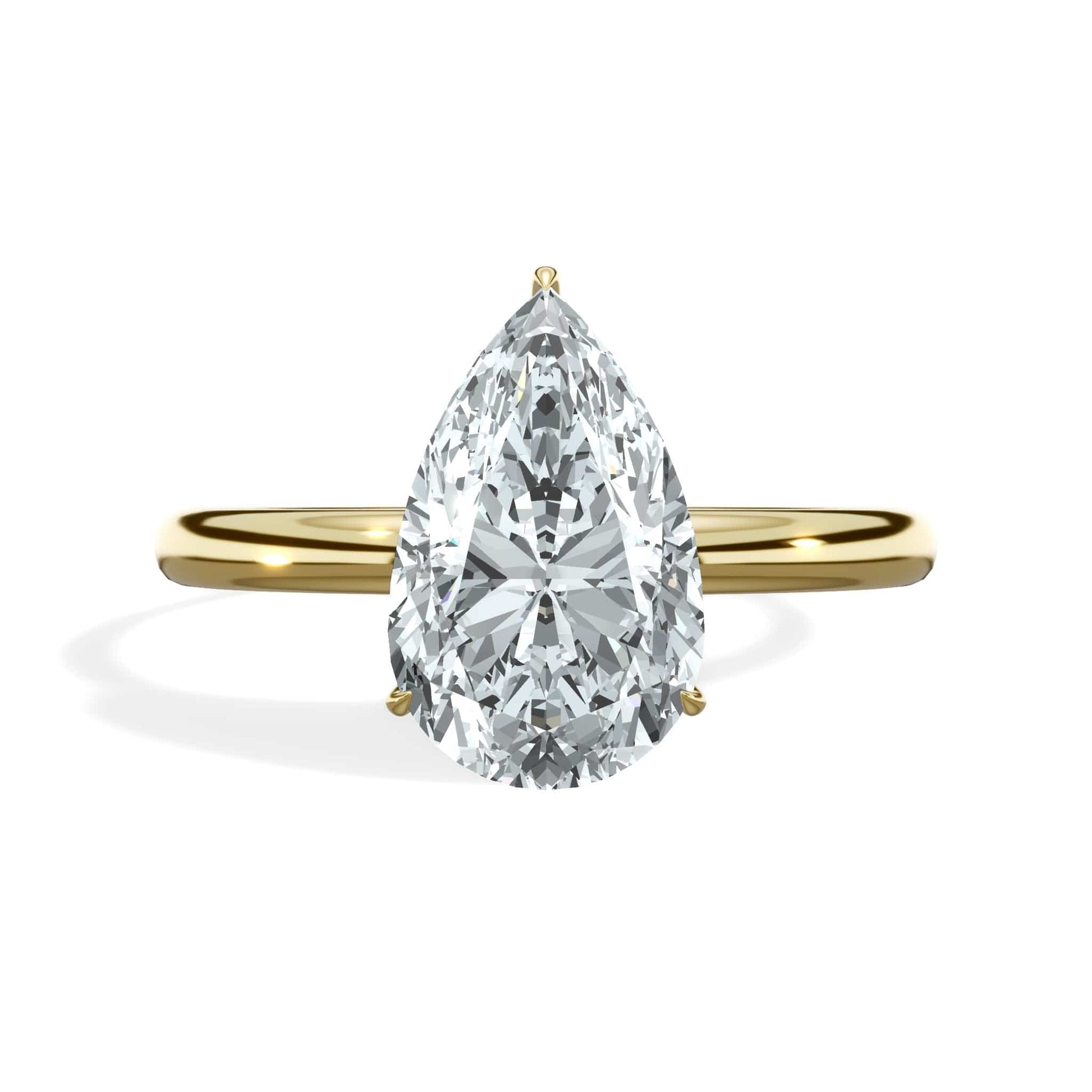 Pear diamond ring in yellow gold