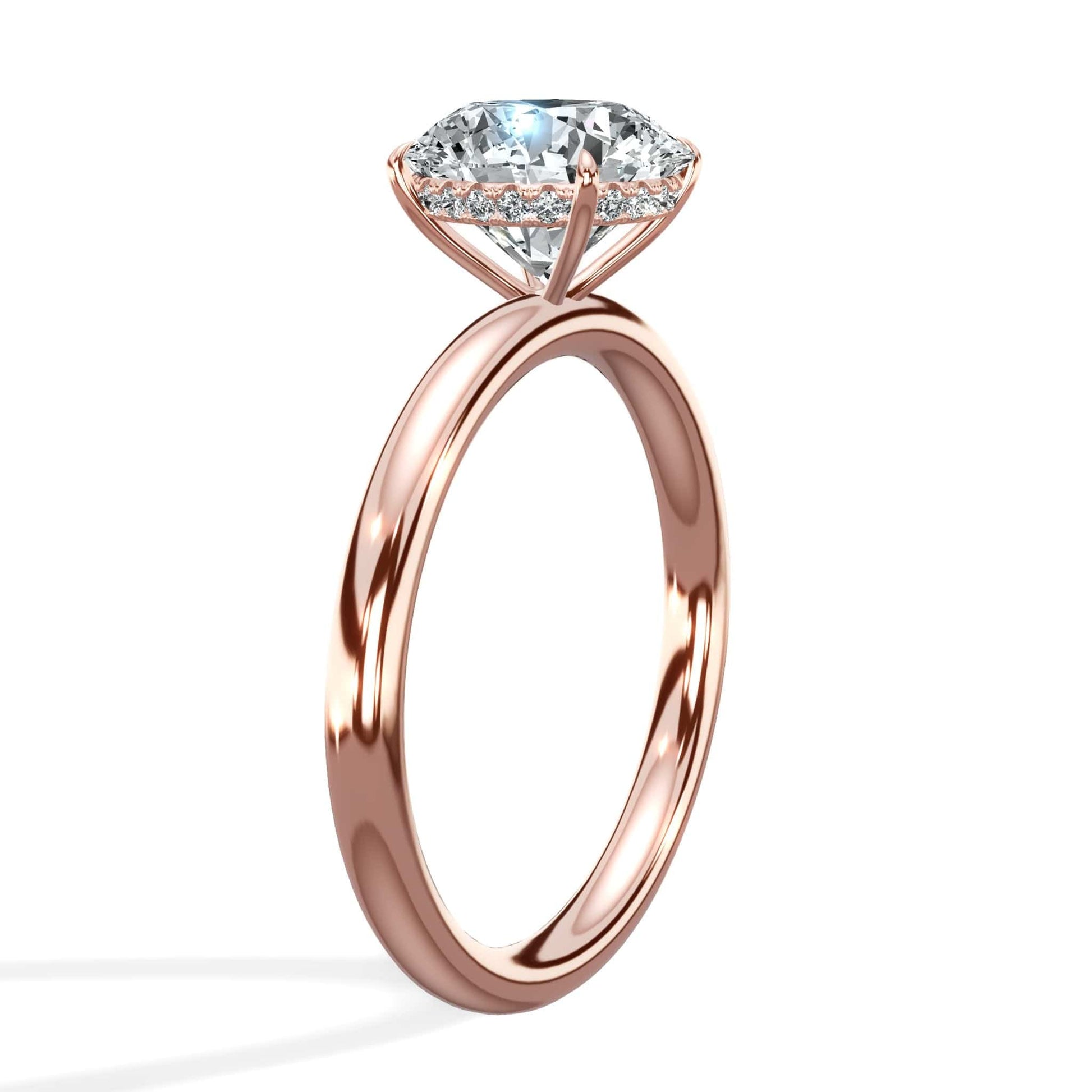 Round diamond rose gold engagement ring