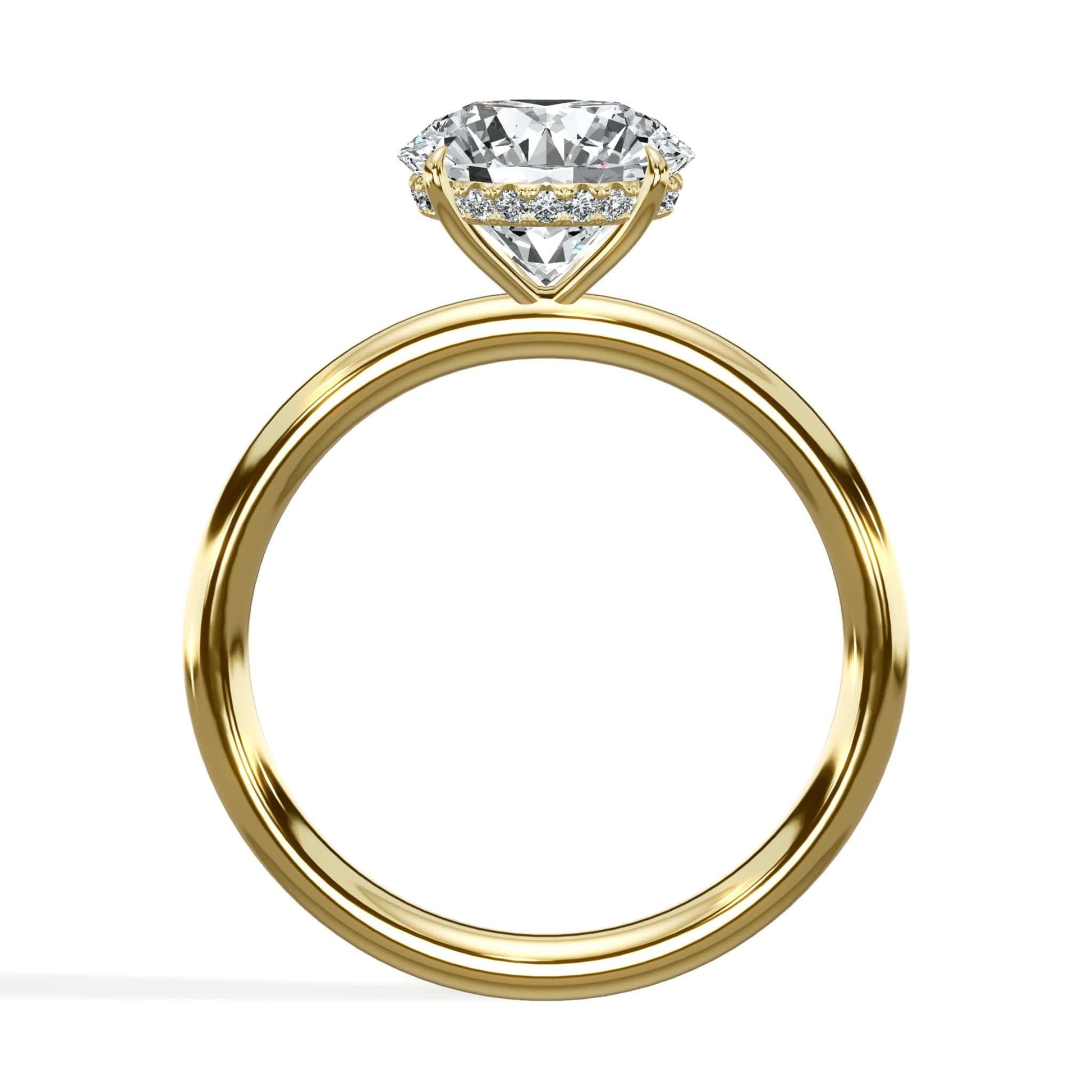 Round diamond ring in yellow gold