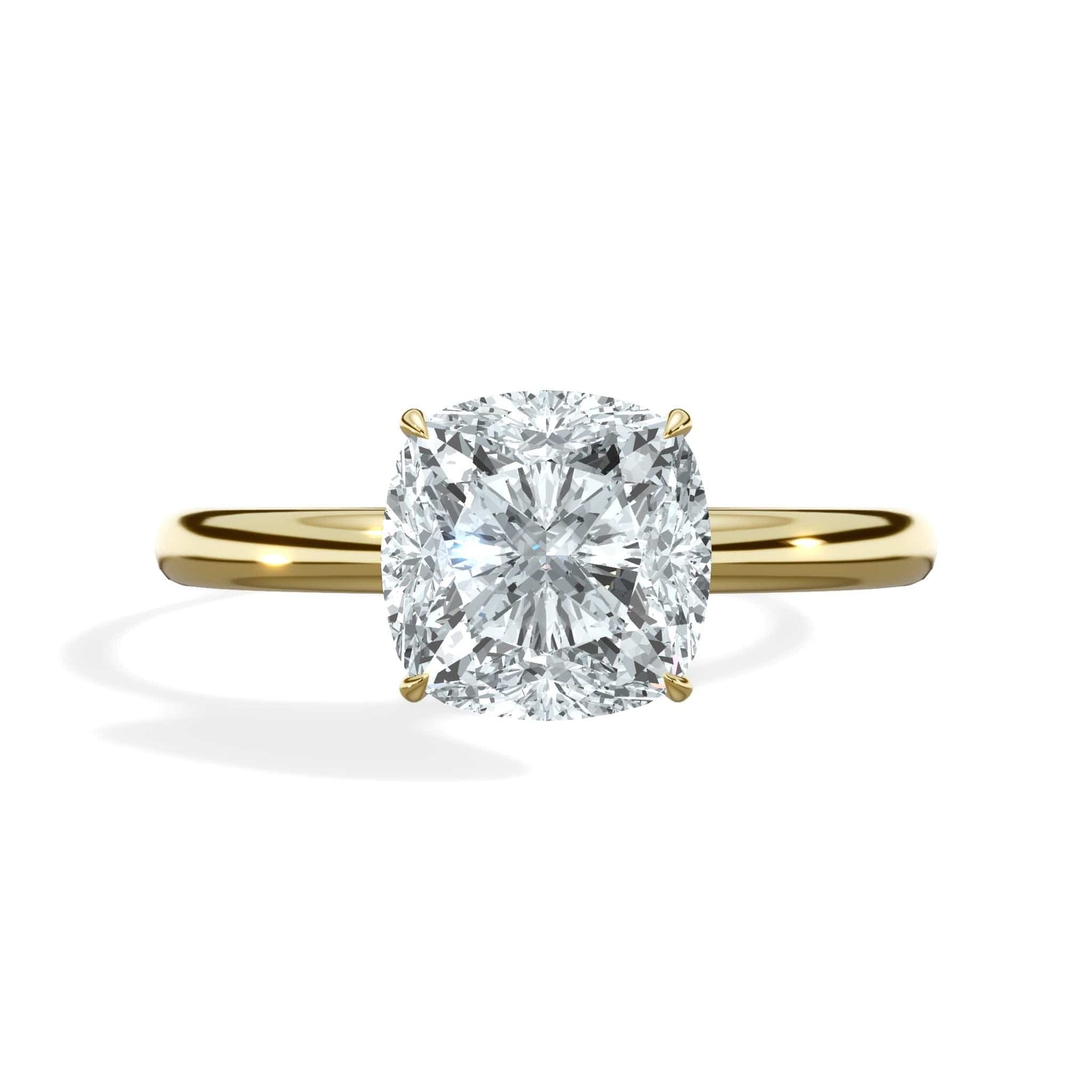 Cushion cut diamond ring in yellow gold