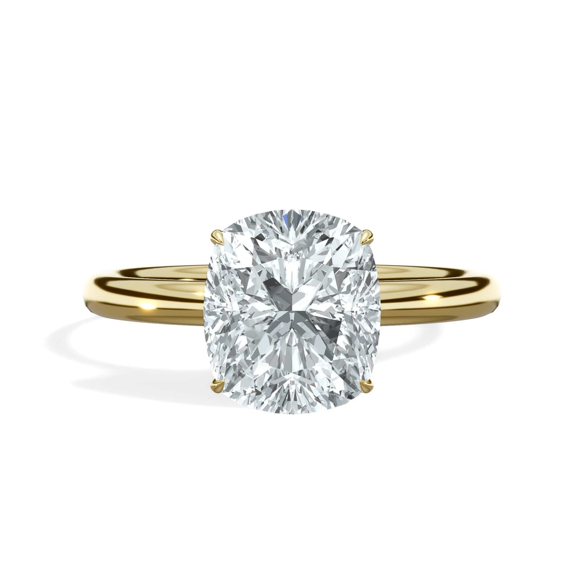 Cushion cut diamond ring in yellow gold