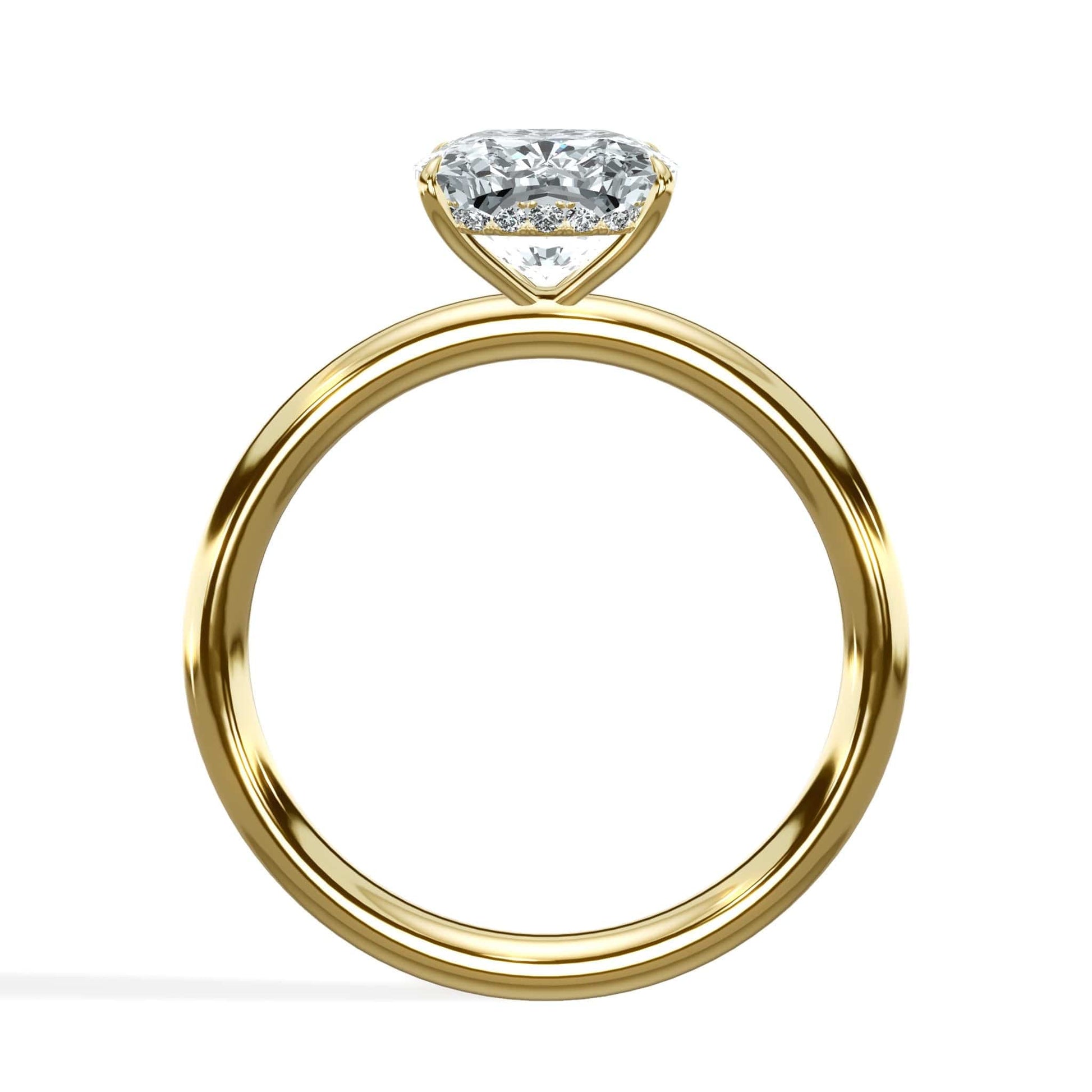 Cushion cut diamond ring in yellow gold