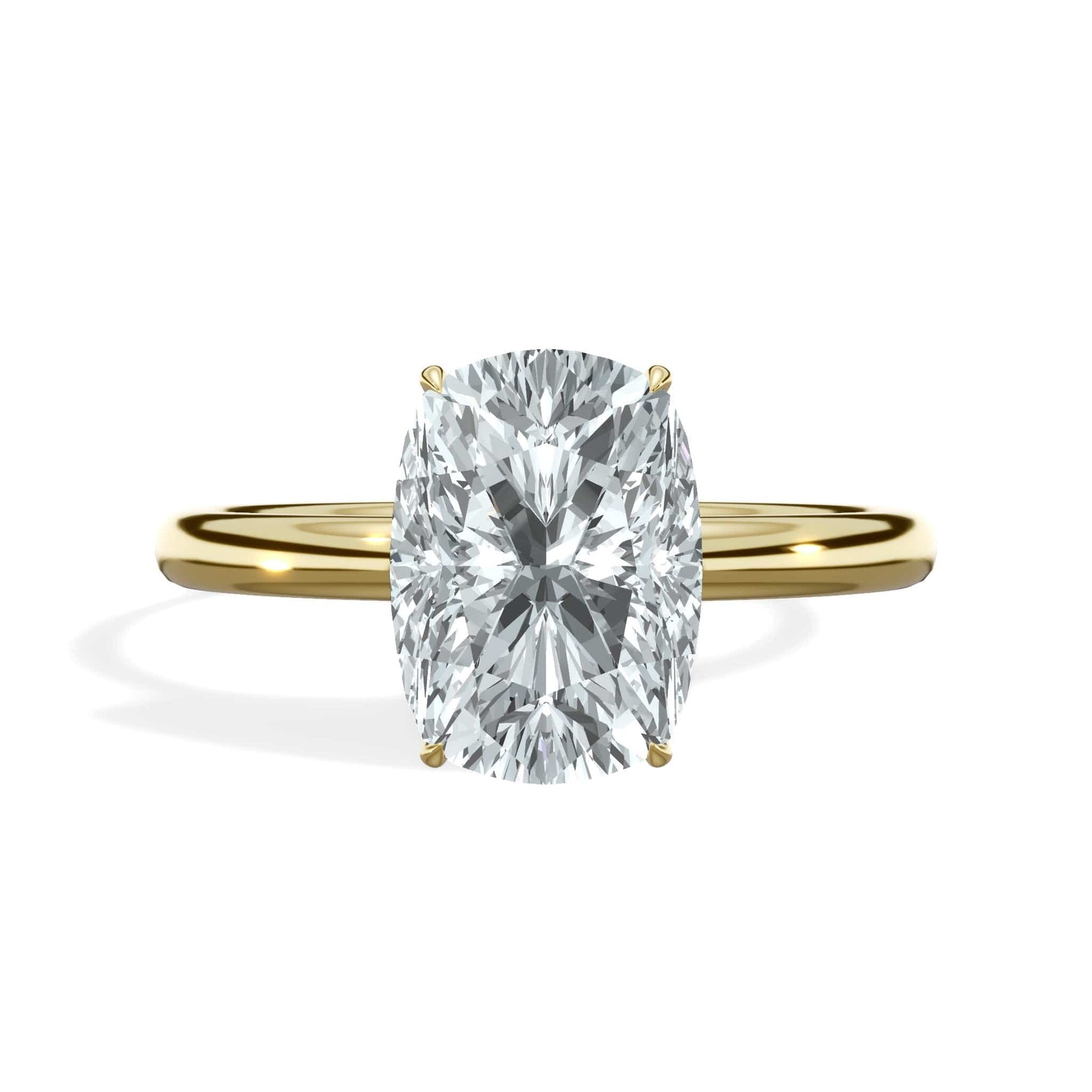 Cushion cut diamond engagement ring in yellow gold