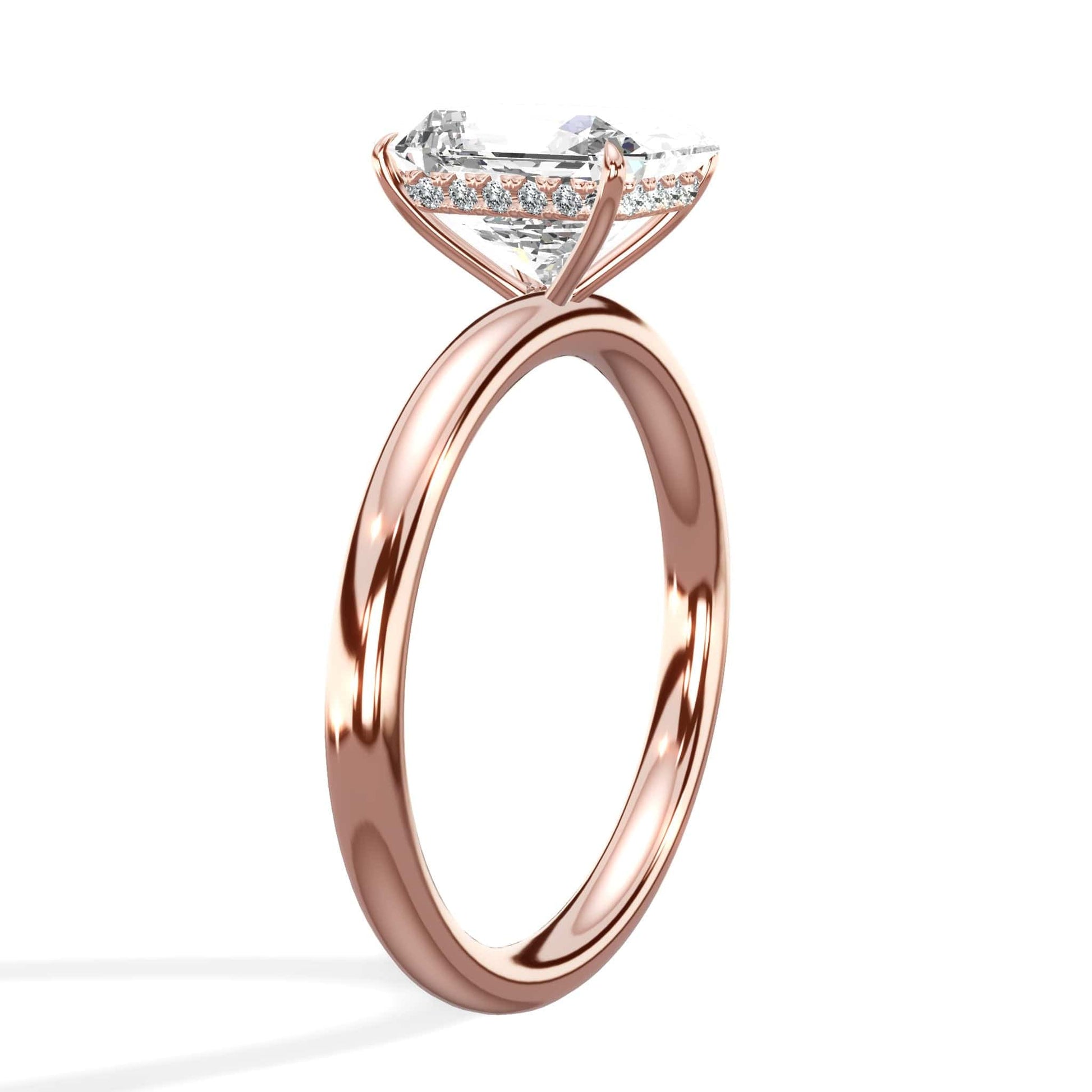 Rose gold oval diamond ring with radiant halo