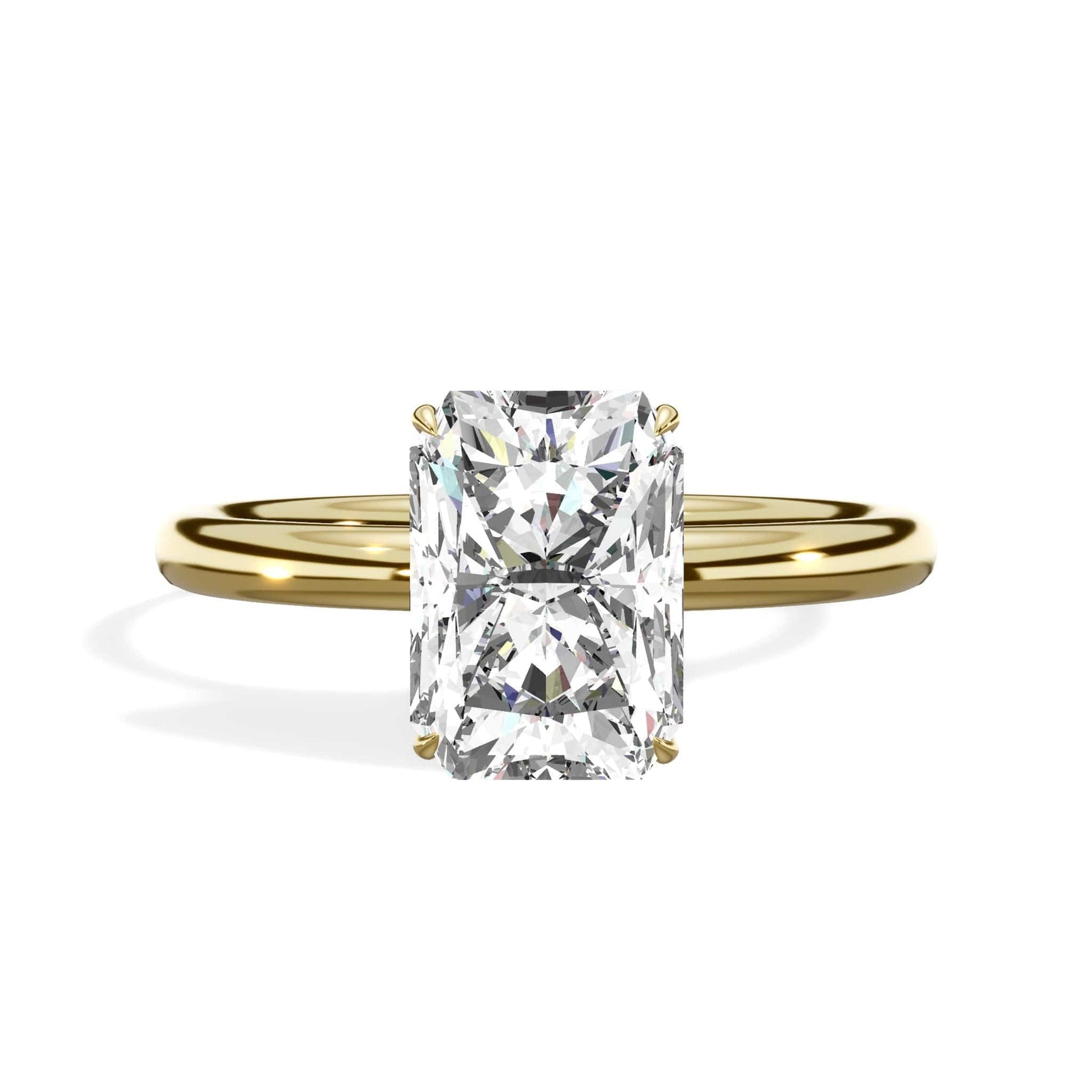 Radiant cut diamond ring in yellow gold