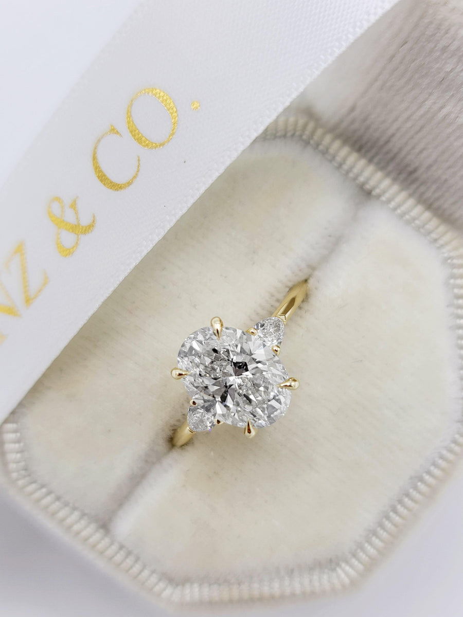 2.40 Carats Lab Grown Oval Cut with Pear Shape Side Stones Diamond Engagement Ring in Yellow Gold - BenzDiamonds