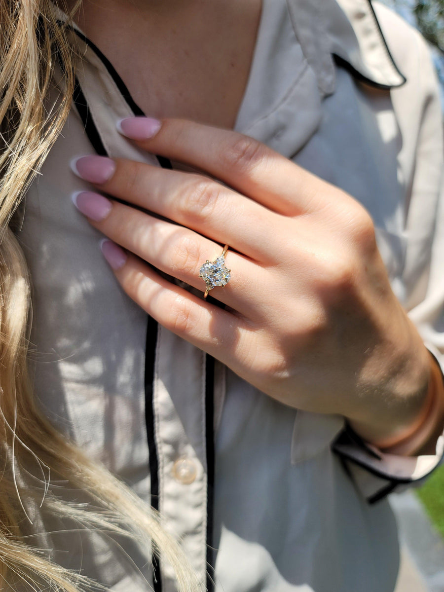 2.40 Carats Lab Grown Oval Cut with Pear Shape Side Stones Diamond Engagement Ring in Yellow Gold - BenzDiamonds