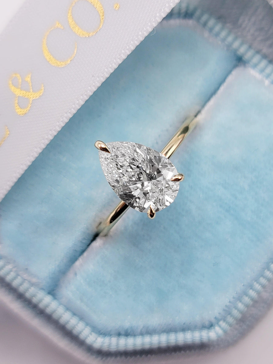Solitaire pear shaped diamond ring Clearance