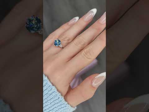 2.35 Carats Lab Grown Fancy Vivid Blue Round Brilliant Cut with Pear Shape Side Stones Diamond Engagement Ring