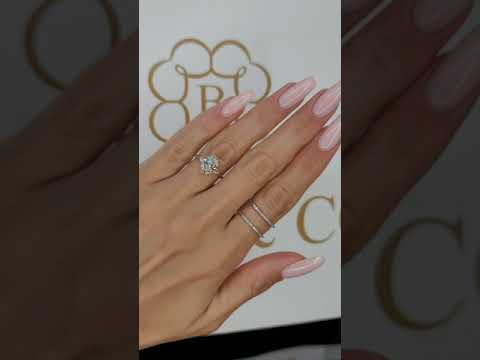 2.29 Carats Lab Grown Oval Cut with Pear Shape Side Stones Diamond Engagement Ring in Rose Gold